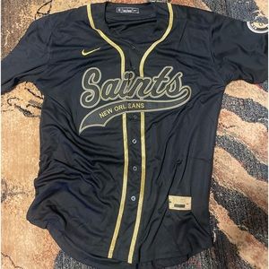 Saints jerseys black green and gold